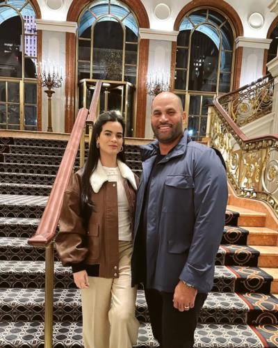 Albert Pujols And Partner: A Radiant Display Of Joy
