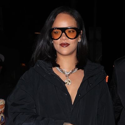 Rihanna Levels Up Her Humble Black Puffer With a Designer Denim Trend and Double Chanel Bags