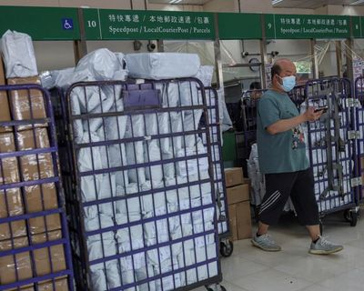 US to slash tariff on small China parcels from 120% to 54%