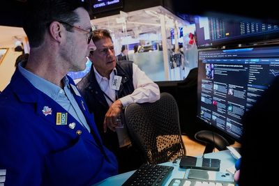 Asian shares slide and US futures and dollar drop after Wall Street's winning week